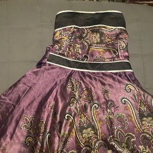 Beautiful purple dress. Nice for dates, weddings, or any occasion.